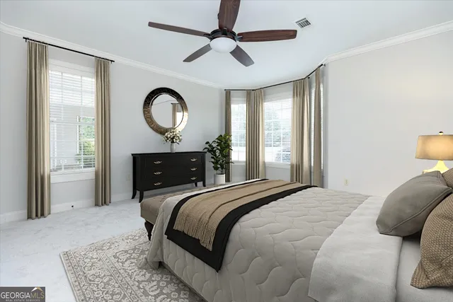 a living room with furniture a rug and a window