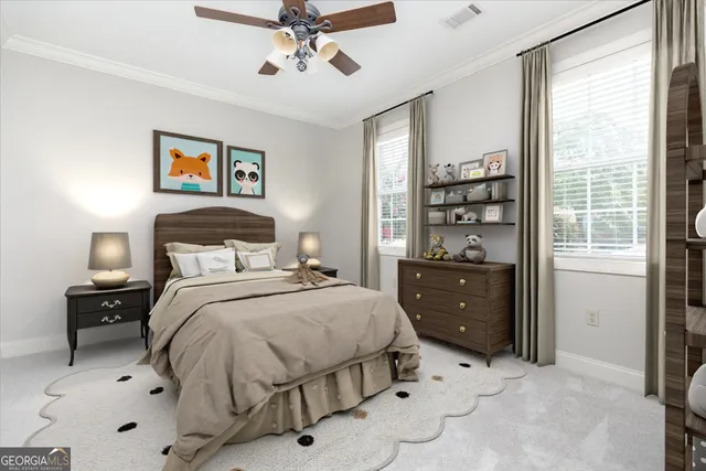 a view of a house with a big yard and a large tree