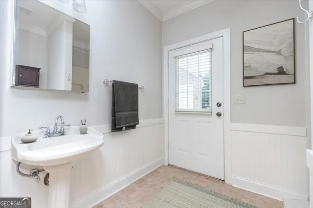 an empty room with wooden floor and closet