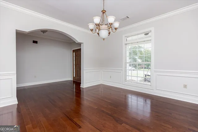 a bathroom with a sink a mirror and a toilet
