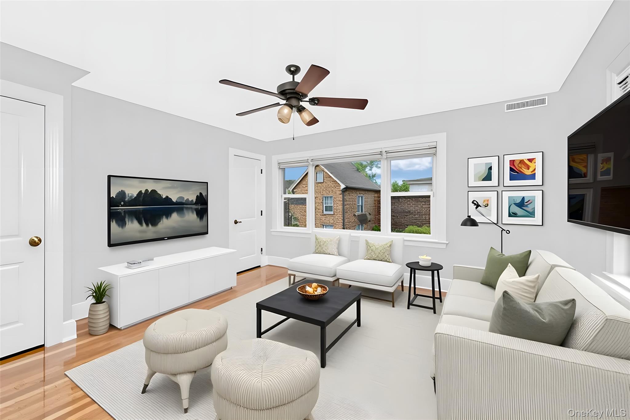 1616 Library Avenue Bronx, NY 10465 - Photo 11 of 20 Living room featuring light wood finished floors and ceiling fan