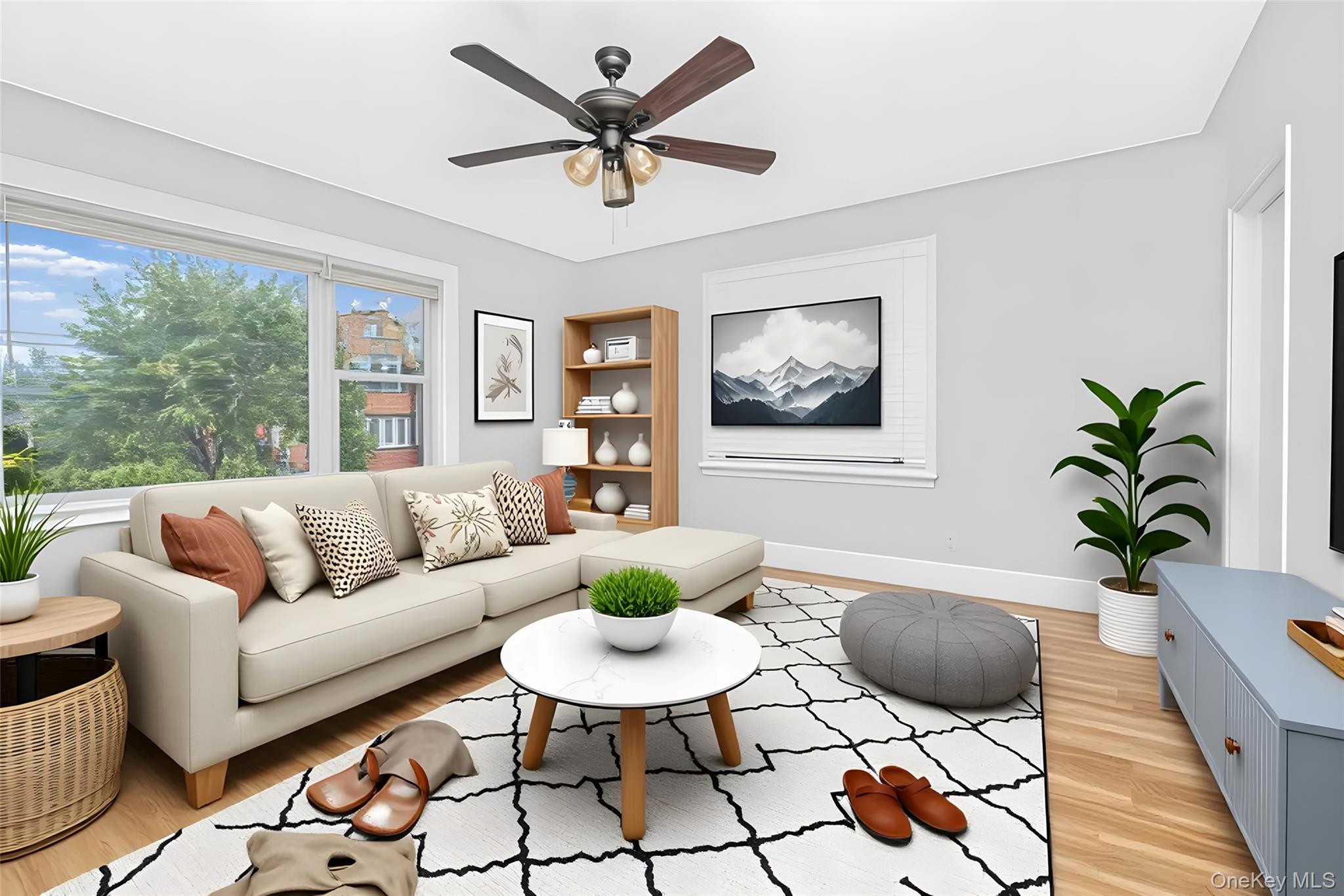 1616 Library Avenue Bronx, NY 10465 - Photo 3 of 20 Living area with light wood finished floors and ceiling fan
