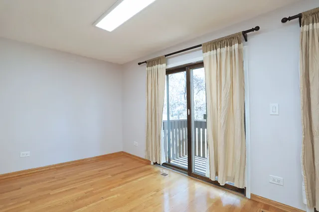 a view of a room with a large window