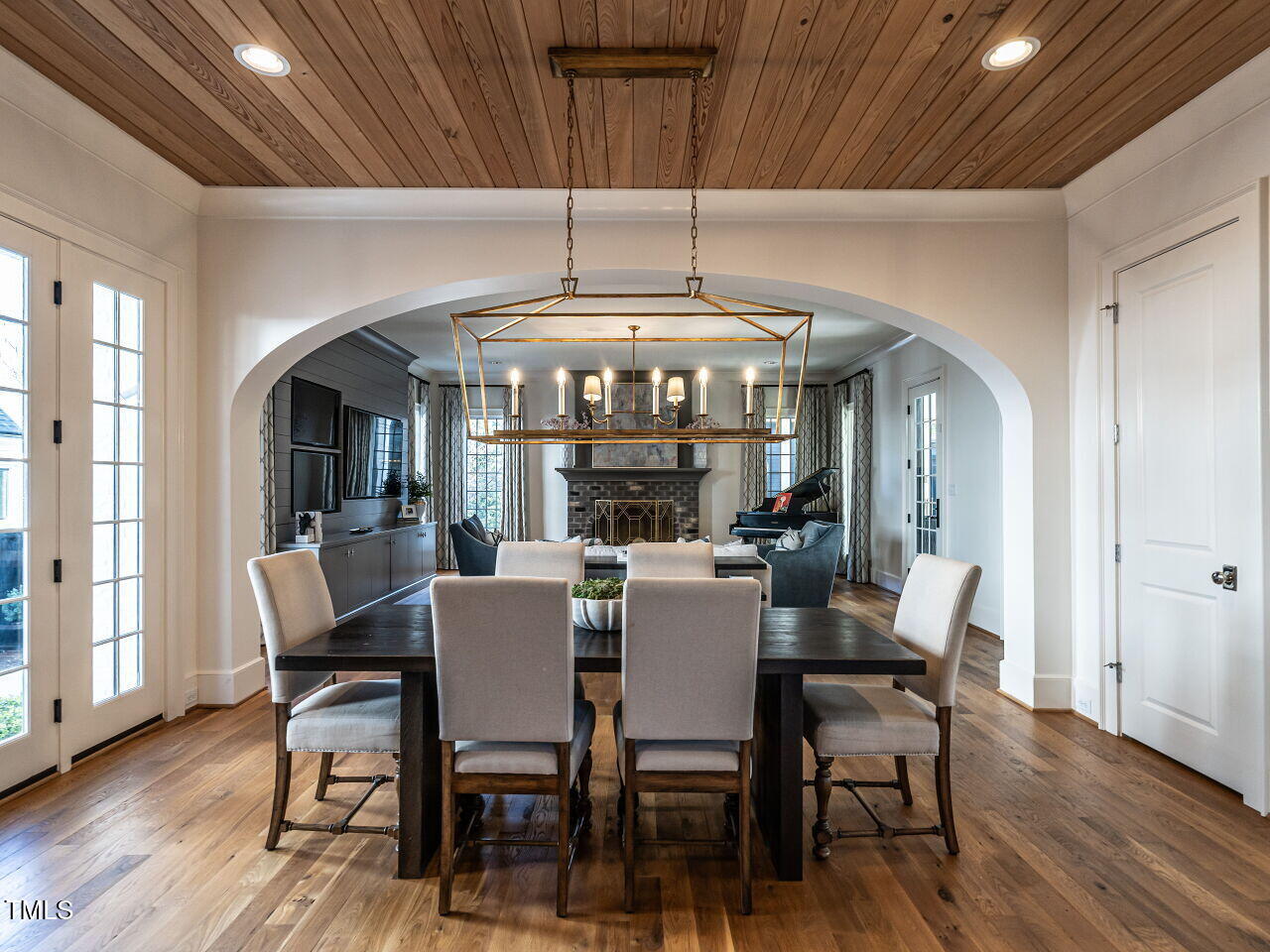 1324 Brooks Avenue Raleigh, NC 27607 - Photo 20 of 65 a view of a dining room with furniture wooden floor and chandelier