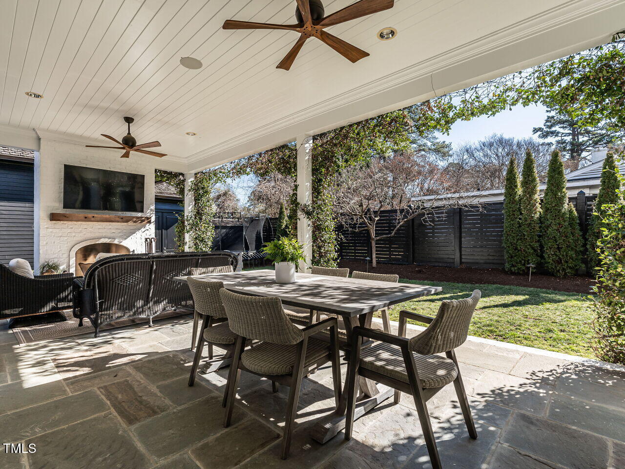 1324 Brooks Avenue Raleigh, NC 27607 - Photo 46 of 65 a view of a patio with a table and chairs