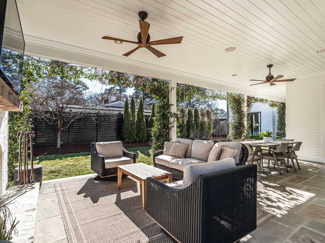 1324 Brooks Avenue Raleigh, NC 27607 - Photo 48 of 65 a outdoor space with patio the couches and a dining table with garden view