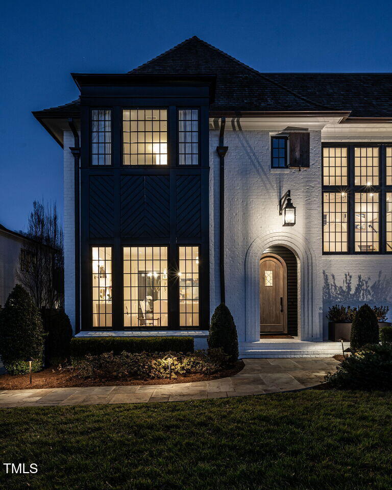 1324 Brooks Avenue Raleigh, NC 27607 - Photo 52 of 65 a front view of a house with a yard
