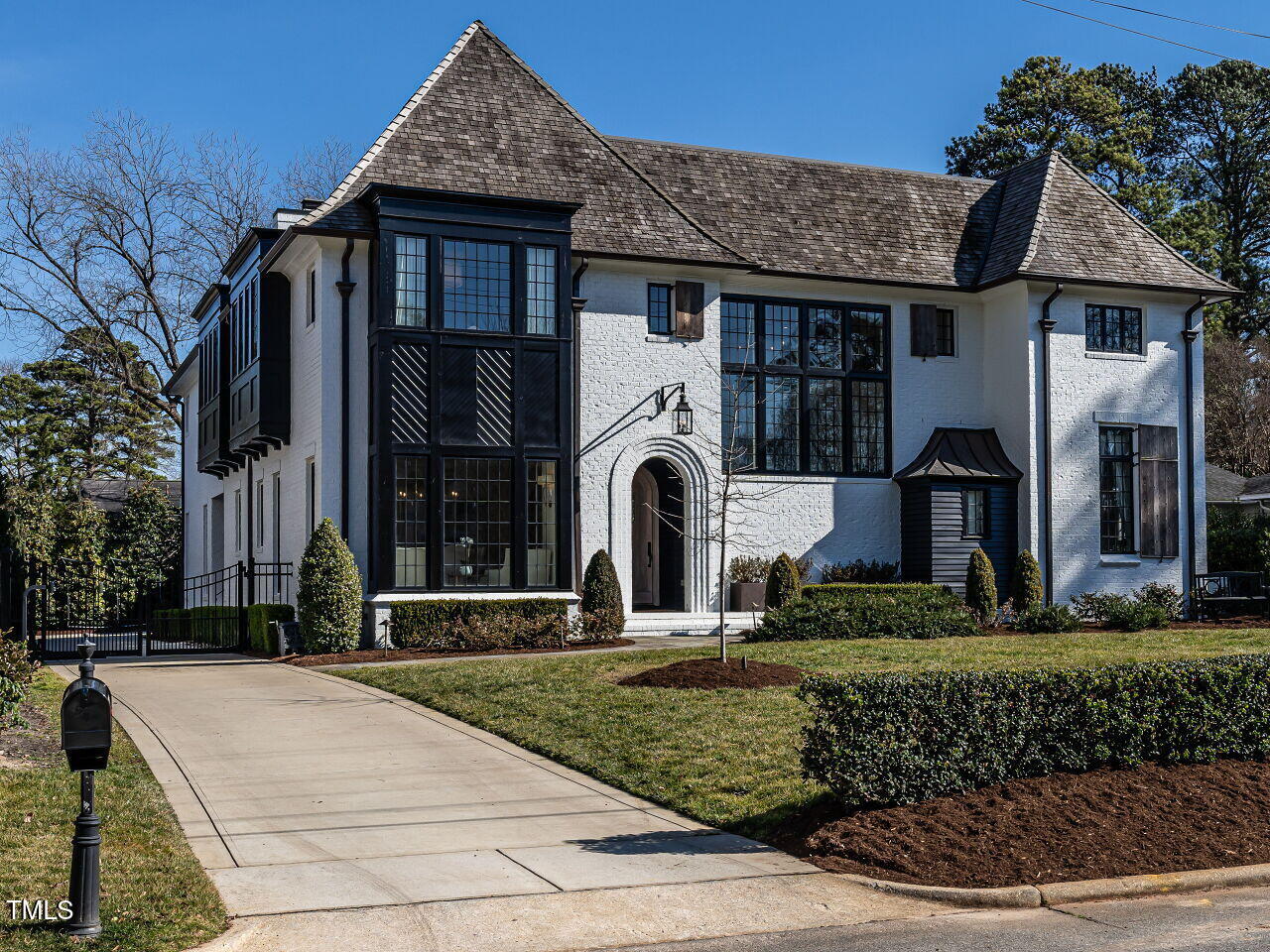 1324 Brooks Avenue Raleigh, NC 27607 - Photo 59 of 65 a front view of a house with garden