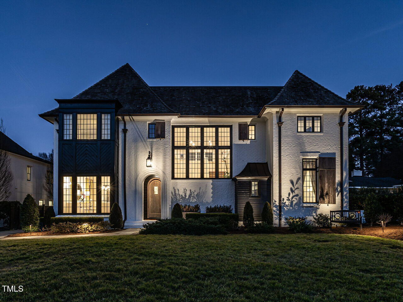 1324 Brooks Avenue Raleigh, NC 27607 - Photo 62 of 65 a front view of a house with a yard