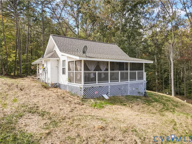 a house with trees in the background
