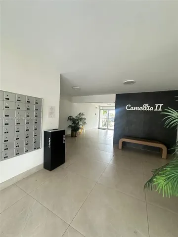a kitchen with stainless steel appliances a stove sink and cabinets