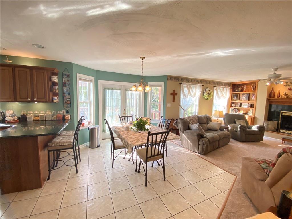 5 Short Road Washington, PA 15301 - Photo 3 of 20 a living room with furniture a dining table and chairs