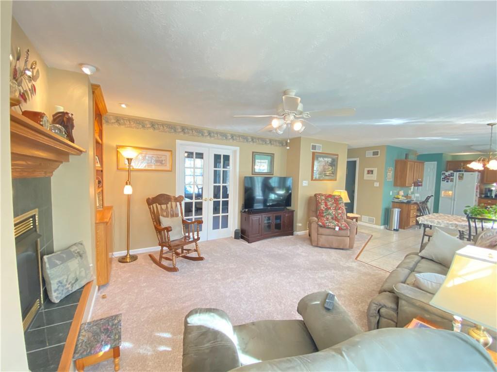 5 Short Road Washington, PA 15301 - Photo 5 of 20 a living room with furniture a dining table and chairs