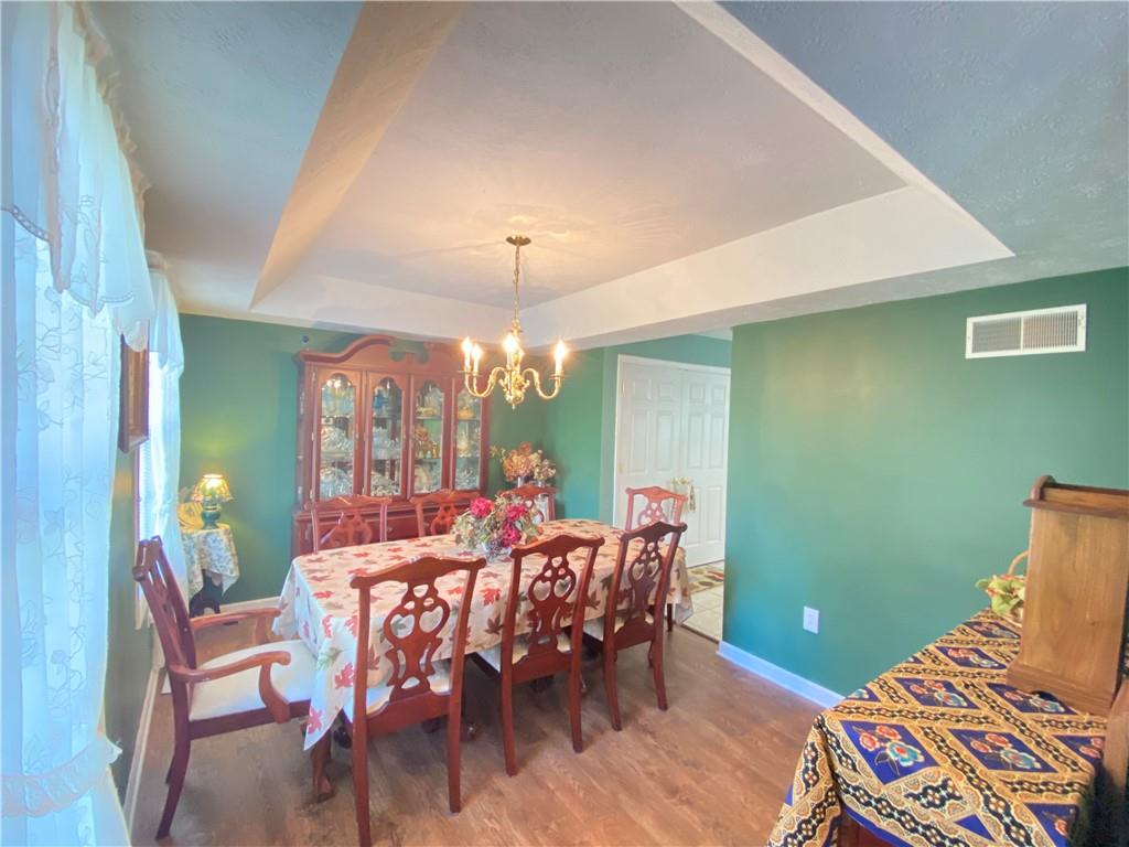 5 Short Road Washington, PA 15301 - Photo 6 of 20 a view of a dining room with furniture and chandelier