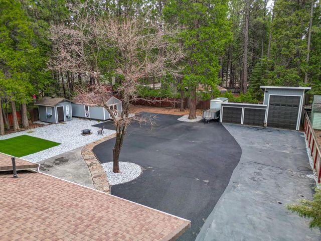 37105 Sapphire Road Burney, CA 96013 - Photo 28 of 39 a view of a backyard with sitting area