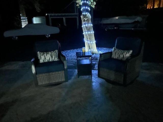 37105 Sapphire Road Burney, CA 96013 - Photo 36 of 39 a living room with furniture and a fireplace