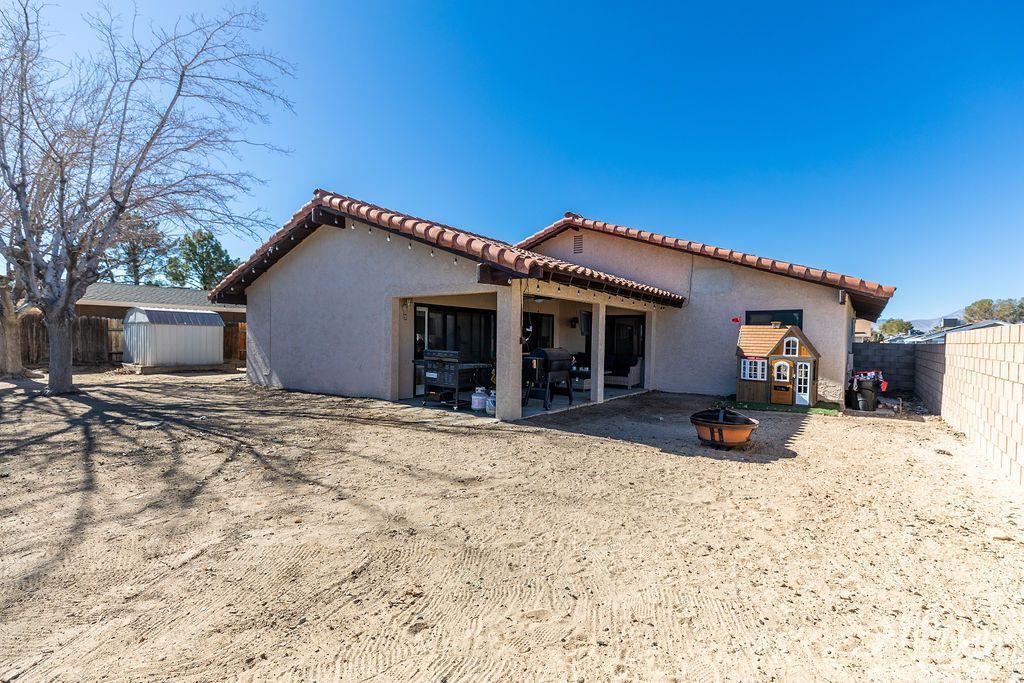 538 North Rio Bravo Street Ridgecrest, CA 93555 - Photo 39 of 45 a view of a house with a yard covered in snow