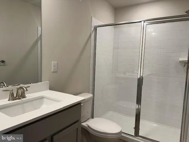 a bathroom with a sink a toilet and bathtub