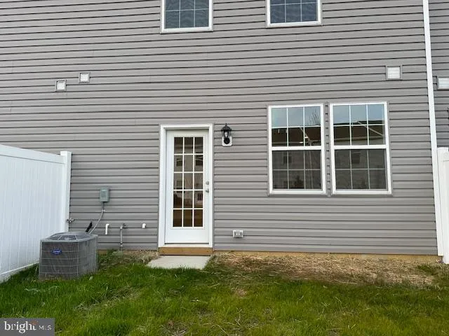 a view of a back yard of the house