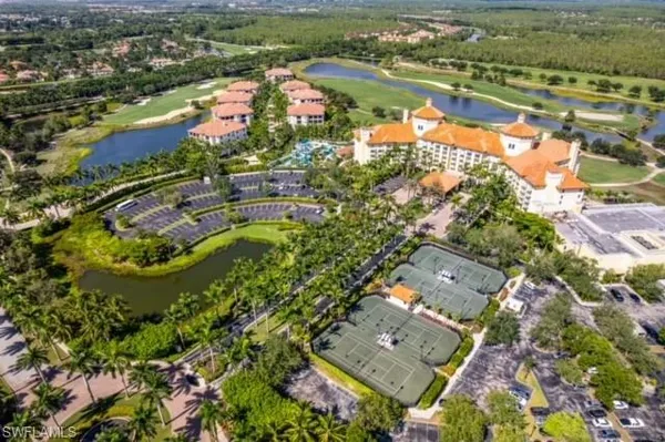 an aerial view of lake residential house with outdoor space and river