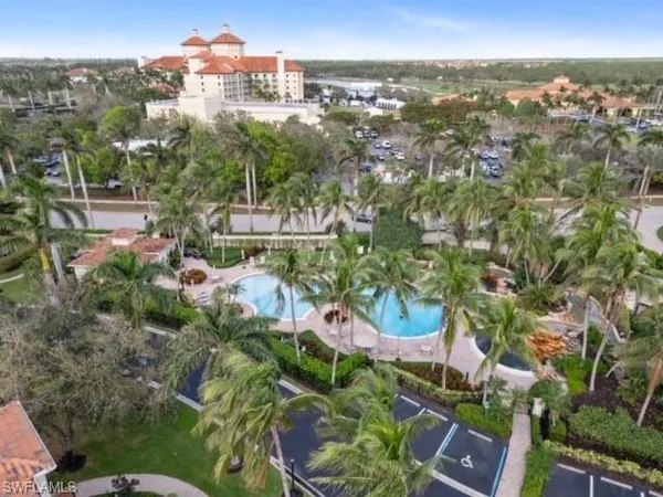 an aerial view of multiple house with yard