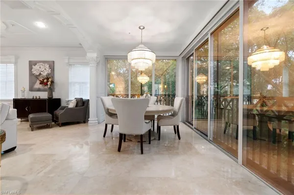 a view of a livingroom with furniture window and outside view