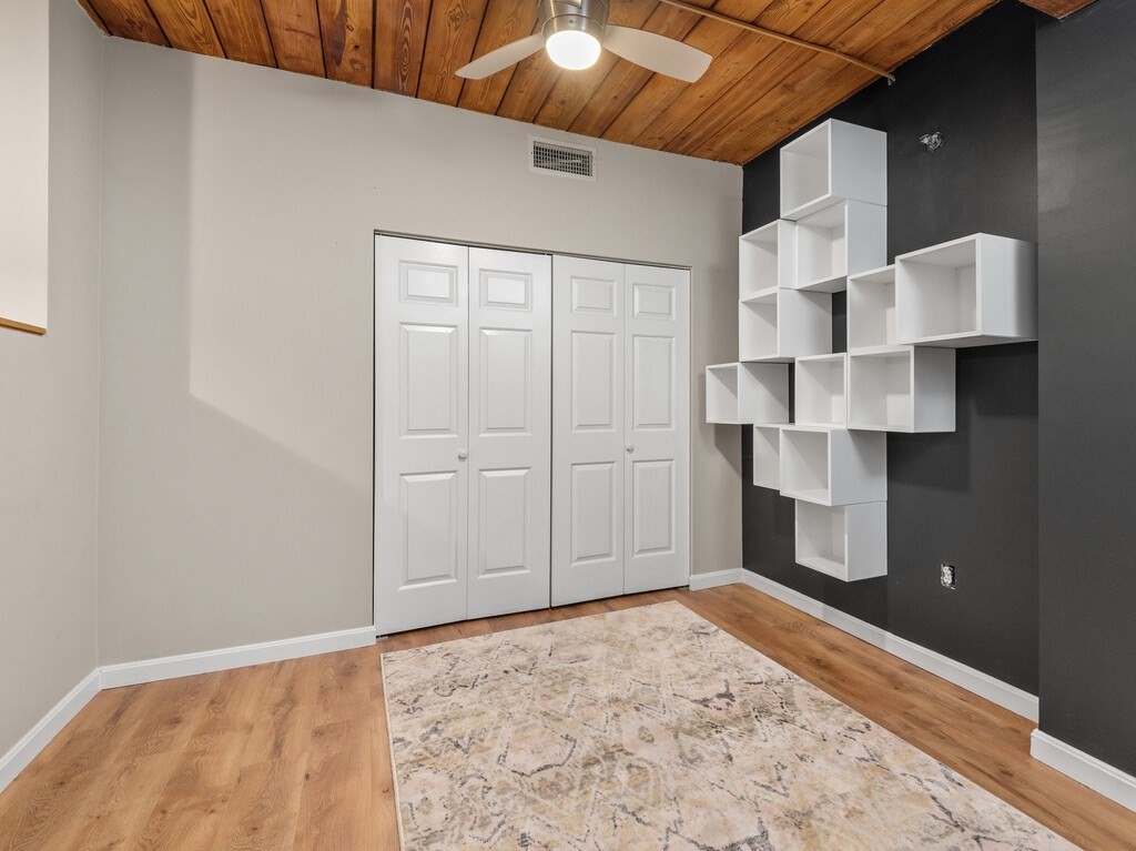10 Linwood Street, Unit 214 Malden, MA 02148 - Photo 13 of 37 a view of empty room with wooden floor
