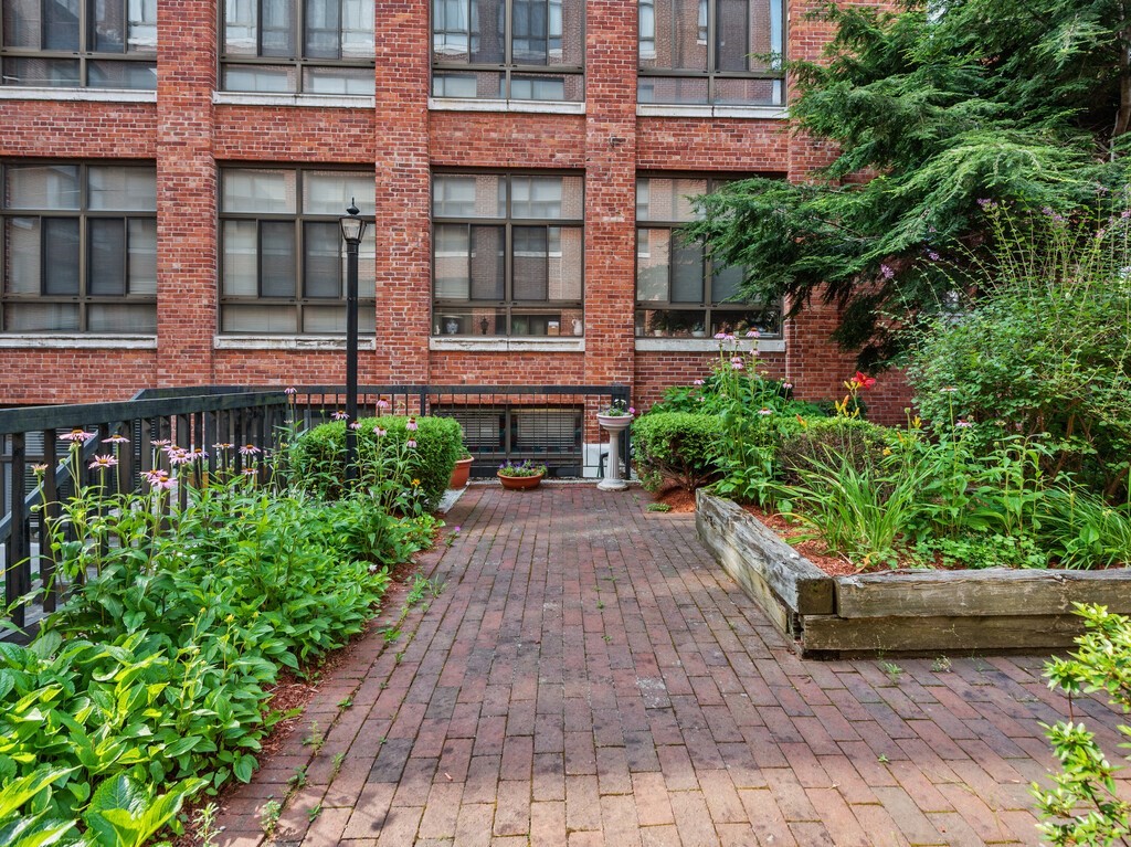 10 Linwood Street, Unit 214 Malden, MA 02148 - Photo 24 of 37 a view of a pathway both side of the house