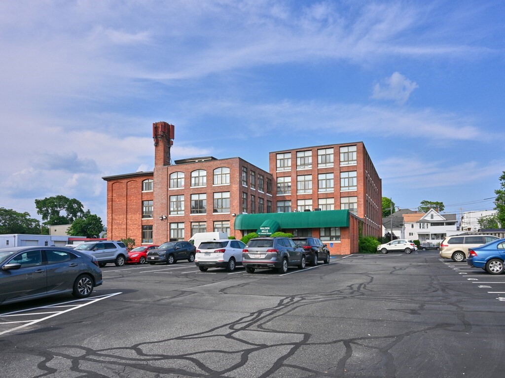 10 Linwood Street, Unit 214 Malden, MA 02148 - Photo 31 of 37 a car parked in front of a building