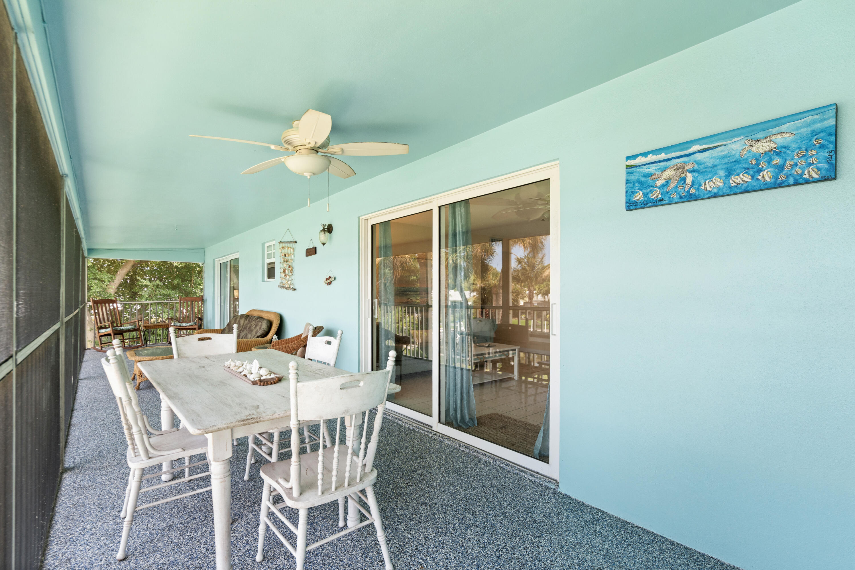 249 Center Street, Unit 2C Jupiter, FL 33458 - Photo 23 of 29 a view of a dining room with furniture window and outside view