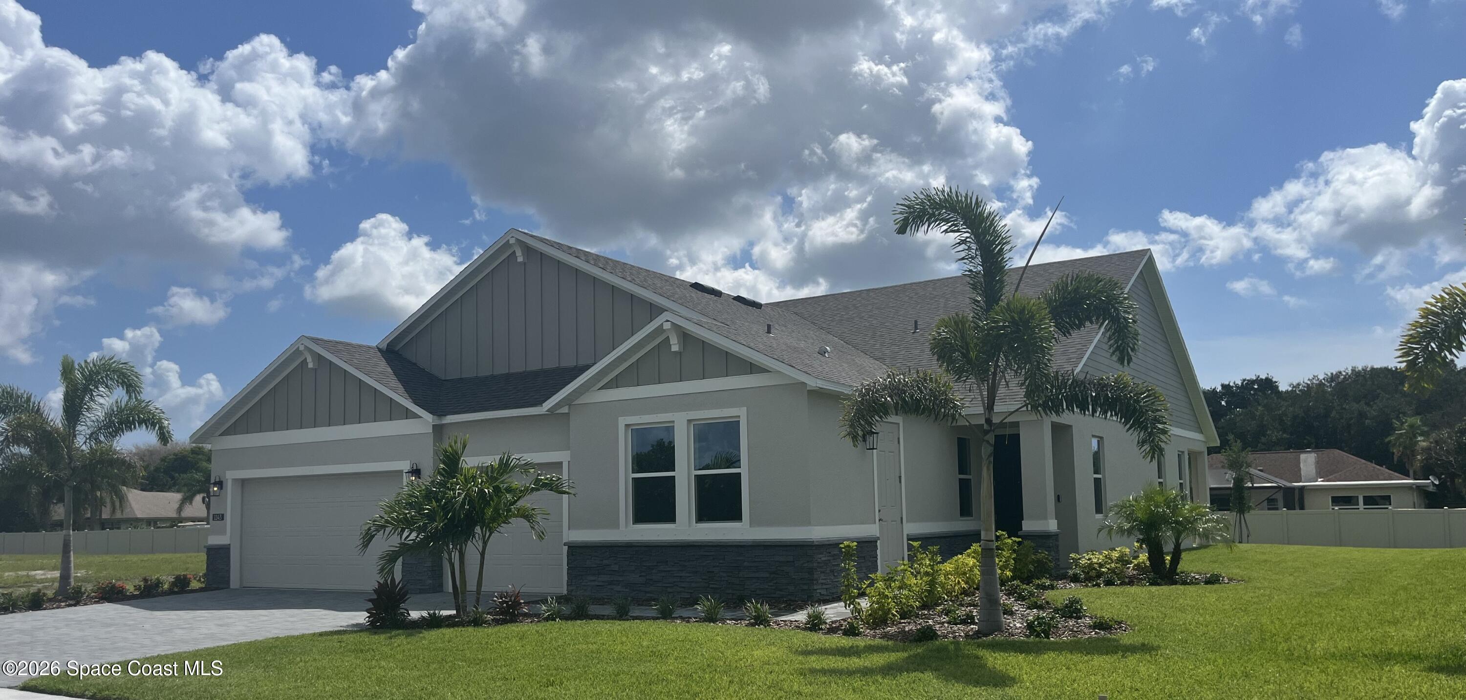 1143 Banff Drive Northeast Palm Bay, FL 32905 - Photo 2 of 6 Front Exterior