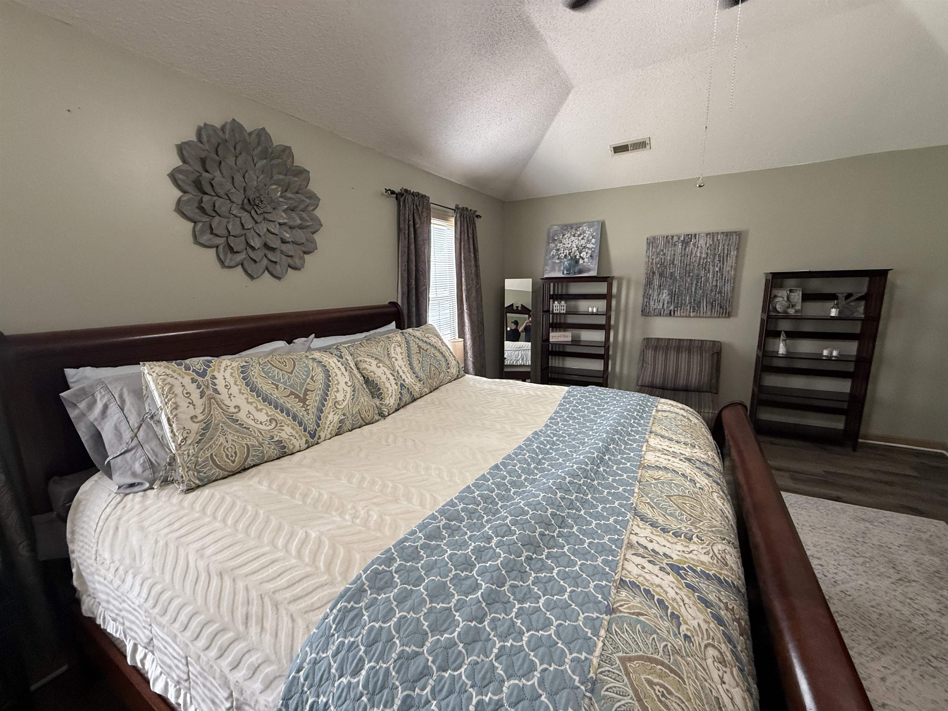 185 Mignon Road Atoka, TN 38004 - Photo 20 of 34 Vaulted ceiling bedroom featuring wood-finish flooring