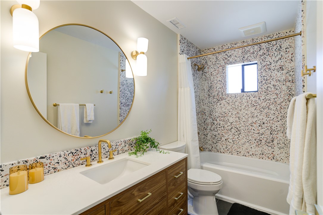 1032 Grass Valley Road Lake Arrowhead, CA 92352 - Photo 16 of 48 a bathroom with a sink mirror toilet and bathtub
