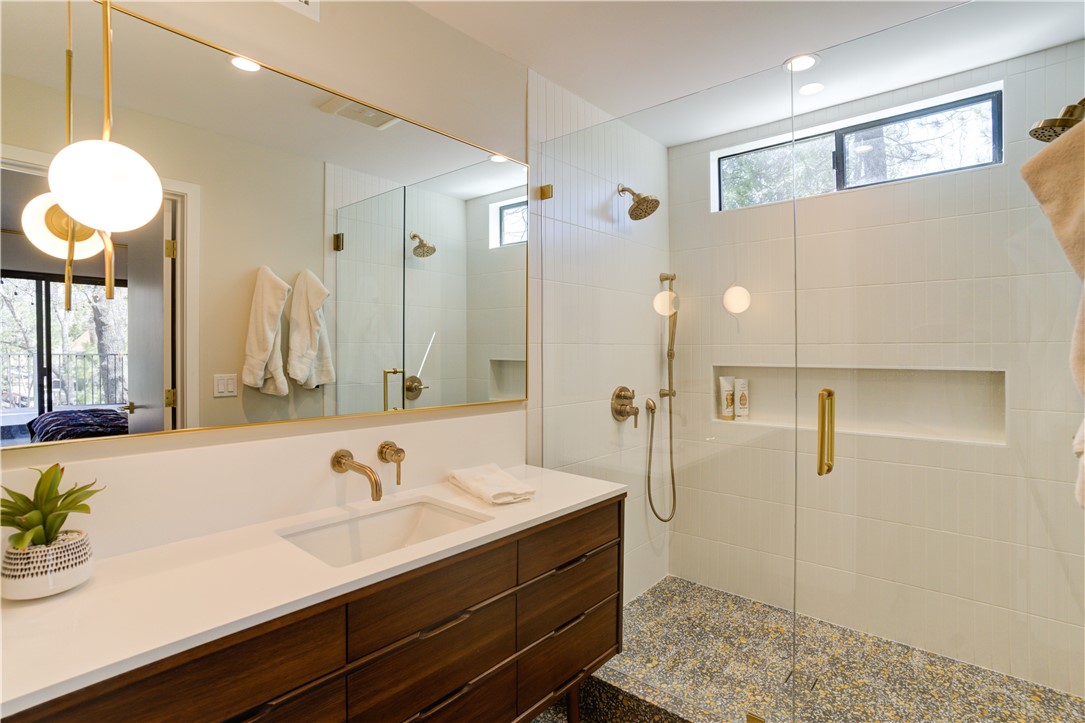 1032 Grass Valley Road Lake Arrowhead, CA 92352 - Photo 35 of 48 a bathroom with a sink and a mirror