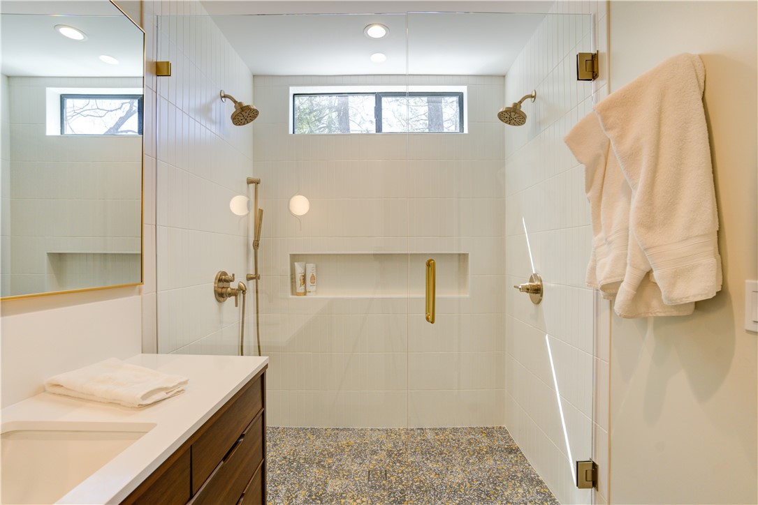 1032 Grass Valley Road Lake Arrowhead, CA 92352 - Photo 37 of 48 a bathroom with a sink and a mirror