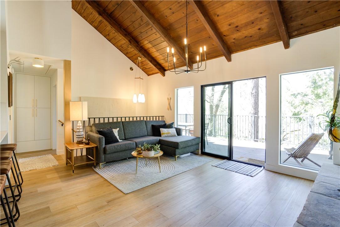 1032 Grass Valley Road Lake Arrowhead, CA 92352 - Photo 7 of 48 a living room with furniture and a large window