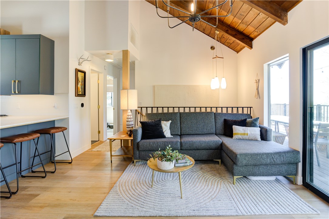 1032 Grass Valley Road Lake Arrowhead, CA 92352 - Photo 8 of 48 a living room with furniture and wooden floor