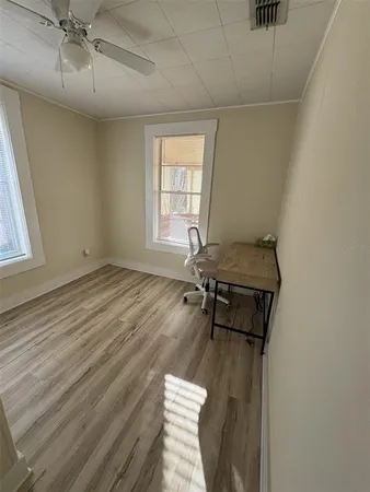 a room with furniture and a window