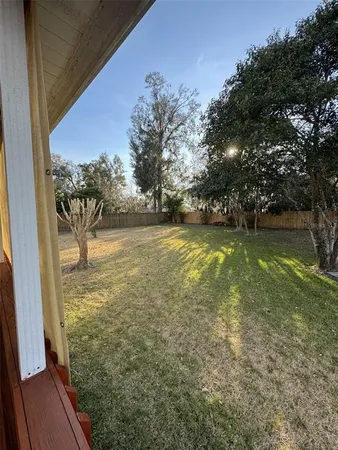 a view of a yard with an outdoor space
