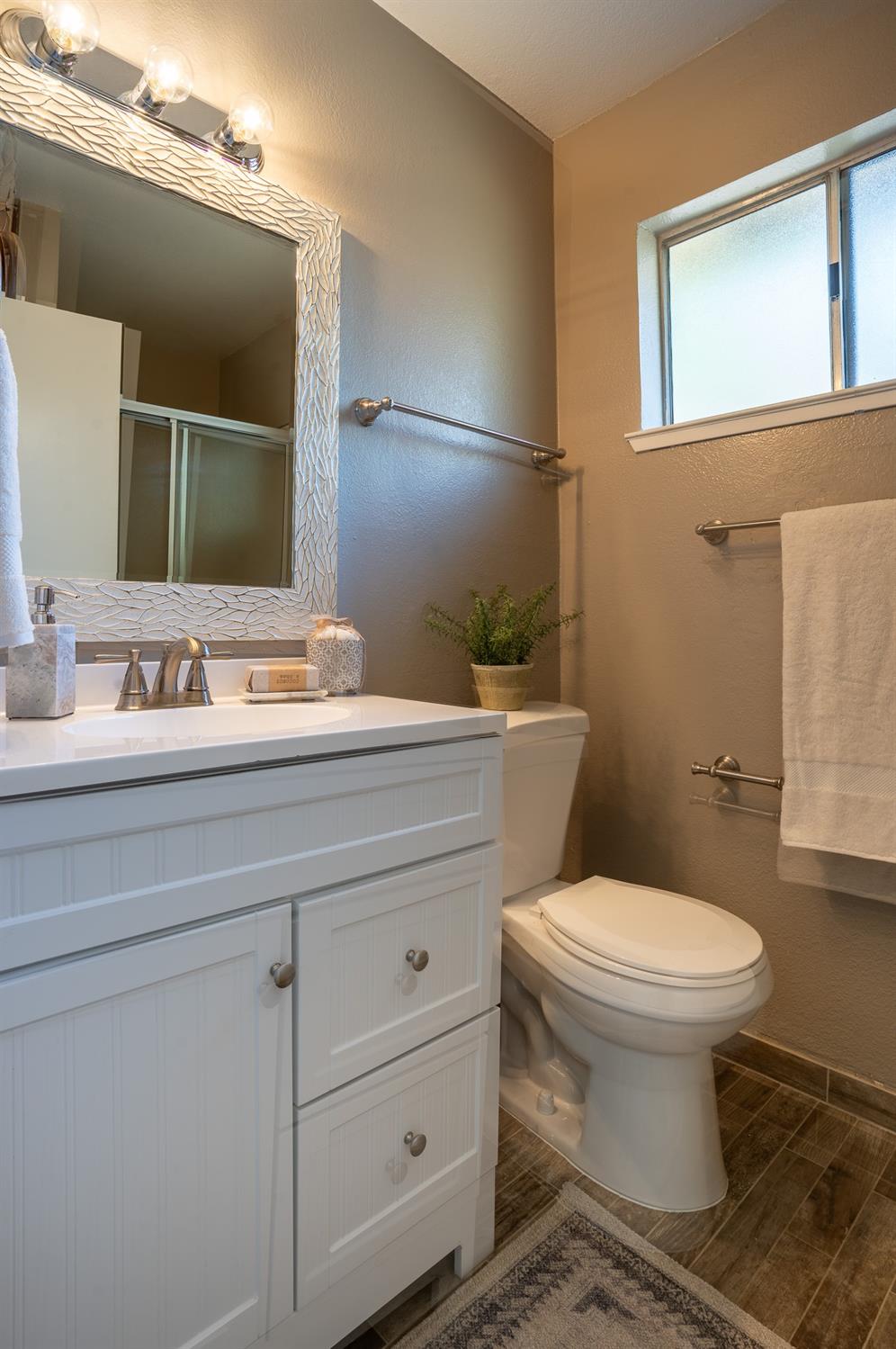 29 Dean Way Folsom, CA 95630 - Photo 13 of 17 a bathroom with a sink toilet and mirror