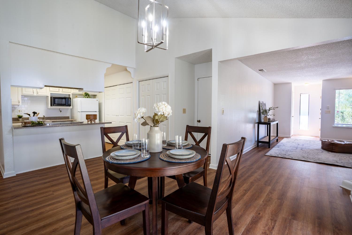 29 Dean Way Folsom, CA 95630 - Photo 7 of 17 a view of a dining room with furniture and wooden floor