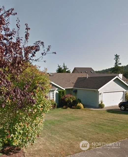 1324 Roma Road Bellingham, WA 98226 - Photo 1 of 1 a view of a house with a yard
