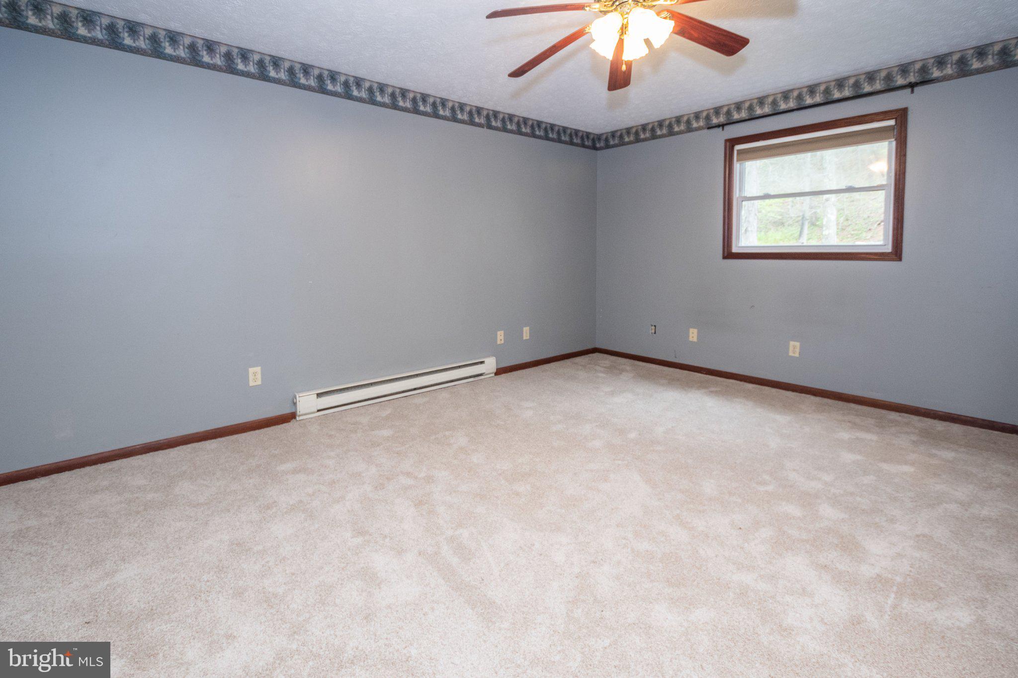 2165 Jennings Road Jennings, MD 21536 - Photo 19 of 23 Spacious room with soft, neutral tones.