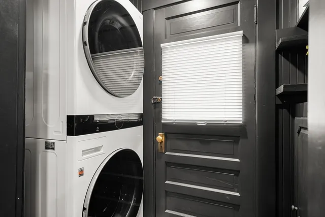 a close view of a utility room with washer and dryer