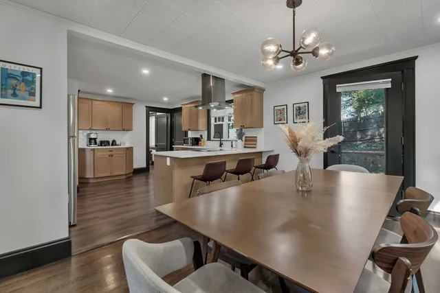 a view of kitchen and dining area with furniture