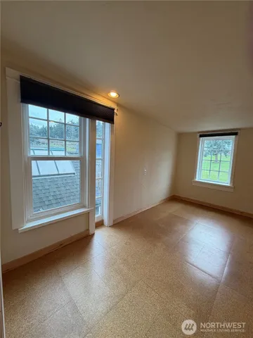 a view of a hallway with closet area