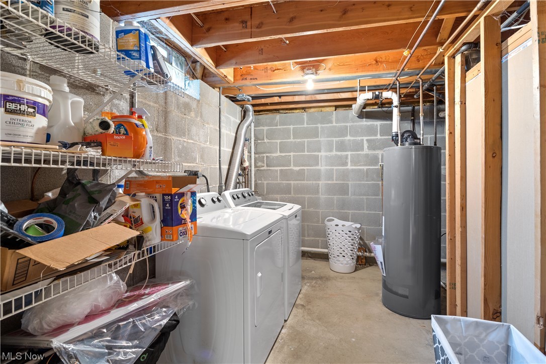 1110 Spring Road Cleveland, OH 44109 - Photo 29 of 33 Laundry room featuring gas water heater and separate washer and dryer