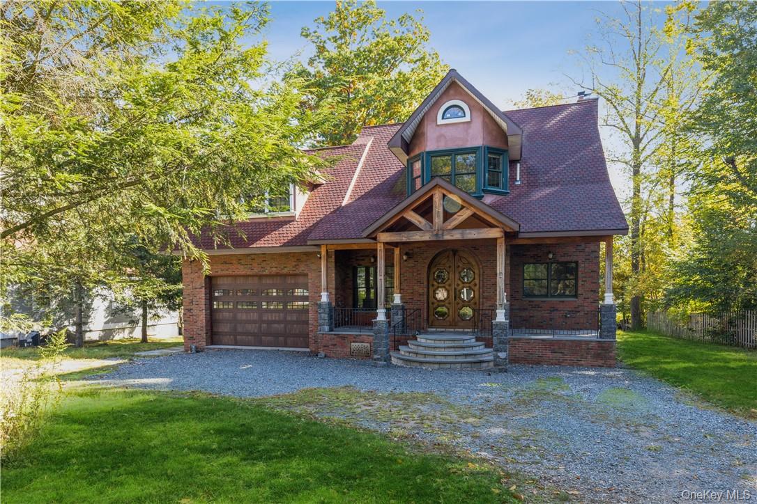 48 Lakewood Drive Congers, NY 10920 - Photo 1 of 19 a front view of a house with garden