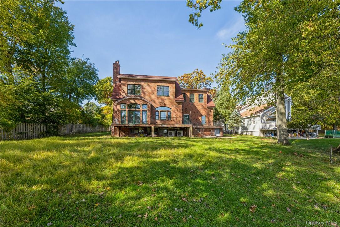 48 Lakewood Drive Congers, NY 10920 - Photo 15 of 19 a view of a big yard with large trees