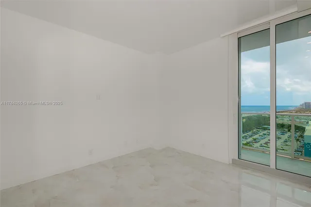 a bathroom with a toilet a sink a mirror and vanity